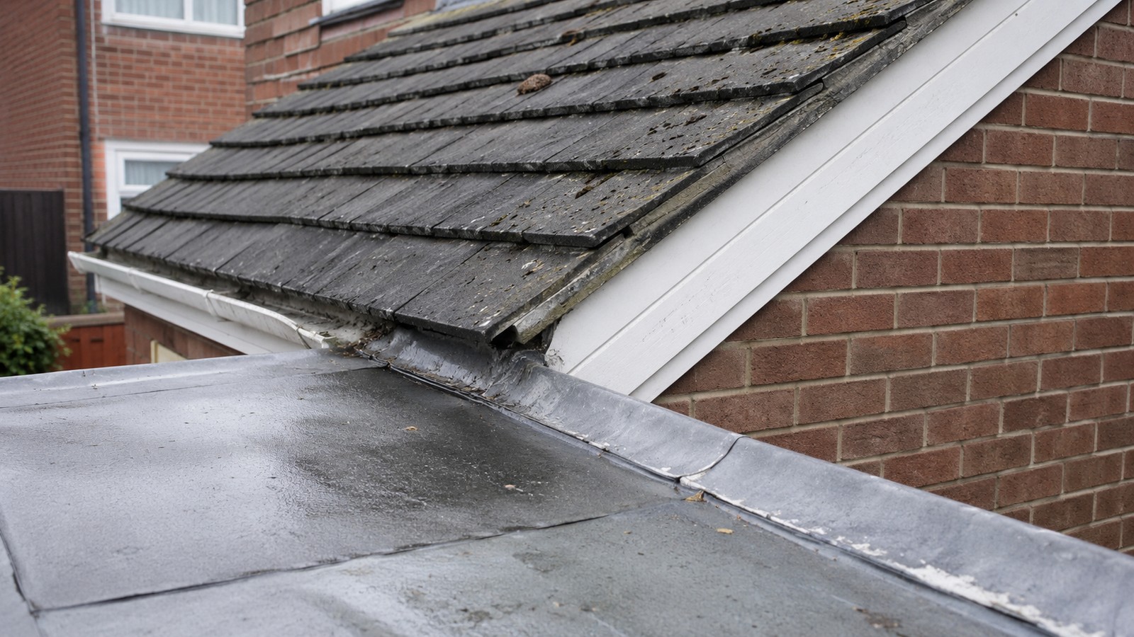 Roof and masonry junction on a brick house